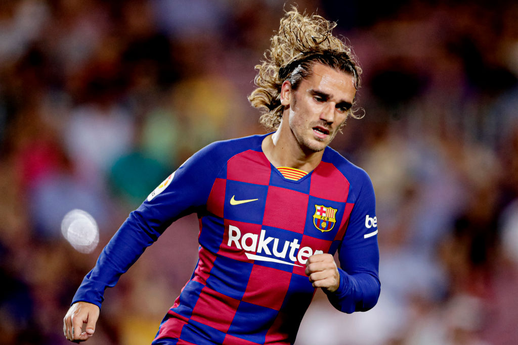 Antoine Griezmann re-signs for Atletico Madrid on loan from Barcelona with obligation to buy